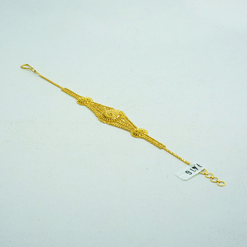 Intricate yellow-gold bracelet-