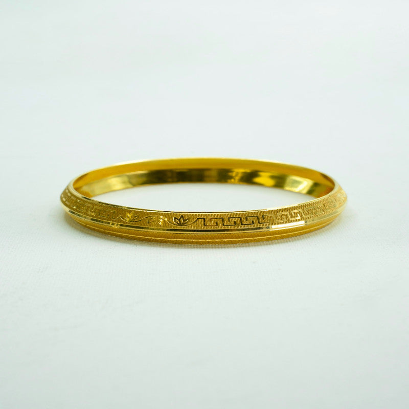 Contemporary designed yellow-gold kada with fine finish and carvings