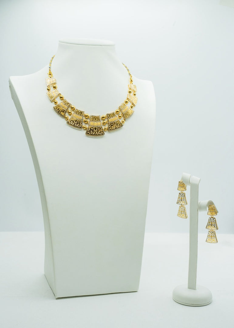 Designer Geometrical gold neckpiece with matching earrings