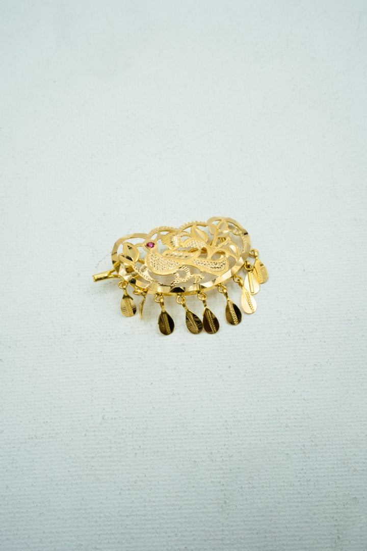 Single piece bright gold trinket