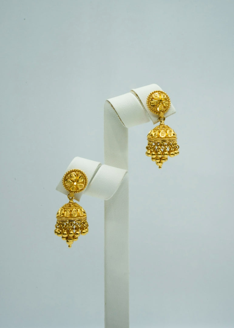 Sunburst Jhumkas in yellow-gold with trinkets