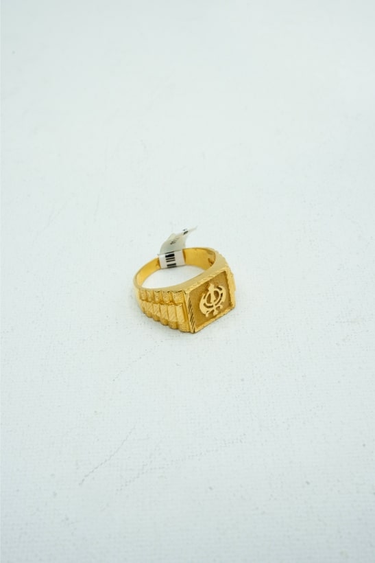 Textured yellow gold square signet ring with carvings