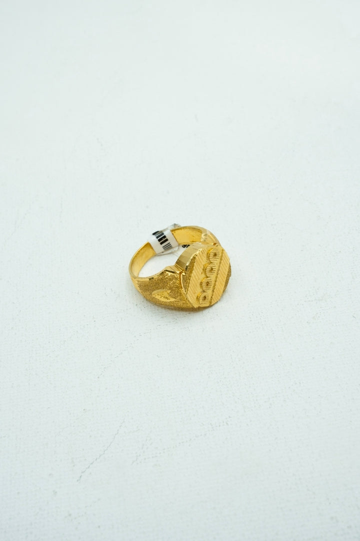 Understated gold signet ring