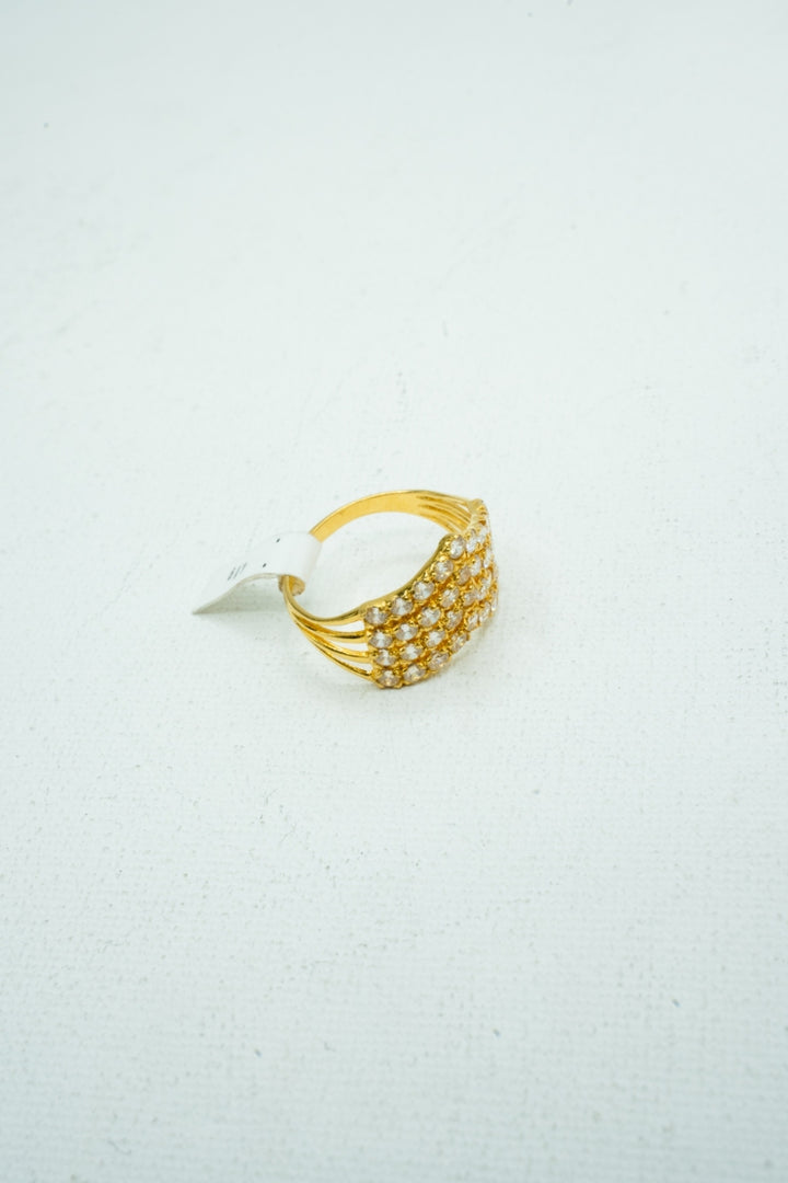 Yellow gold engraved with small diamond studded ring