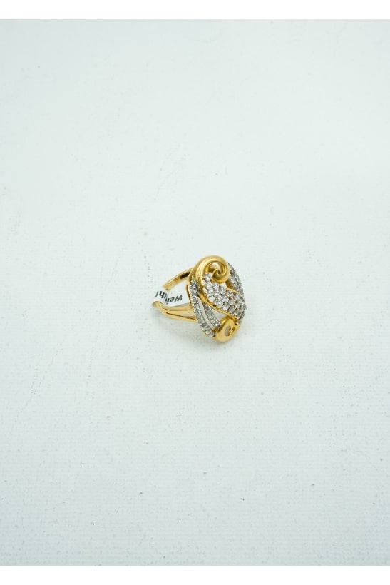 yellow gold with a cluster of diamonds in an S shape insignia ring