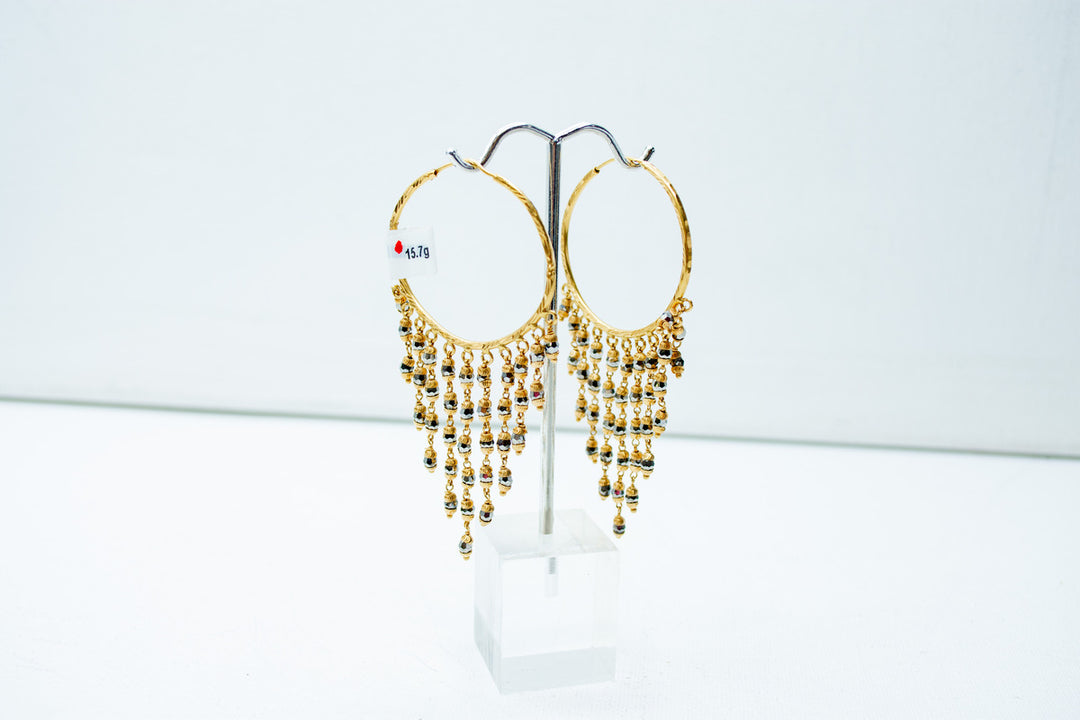 Gold-taselled chandbali earrings