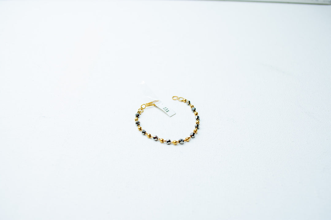 Beaded black and gold bracelet-