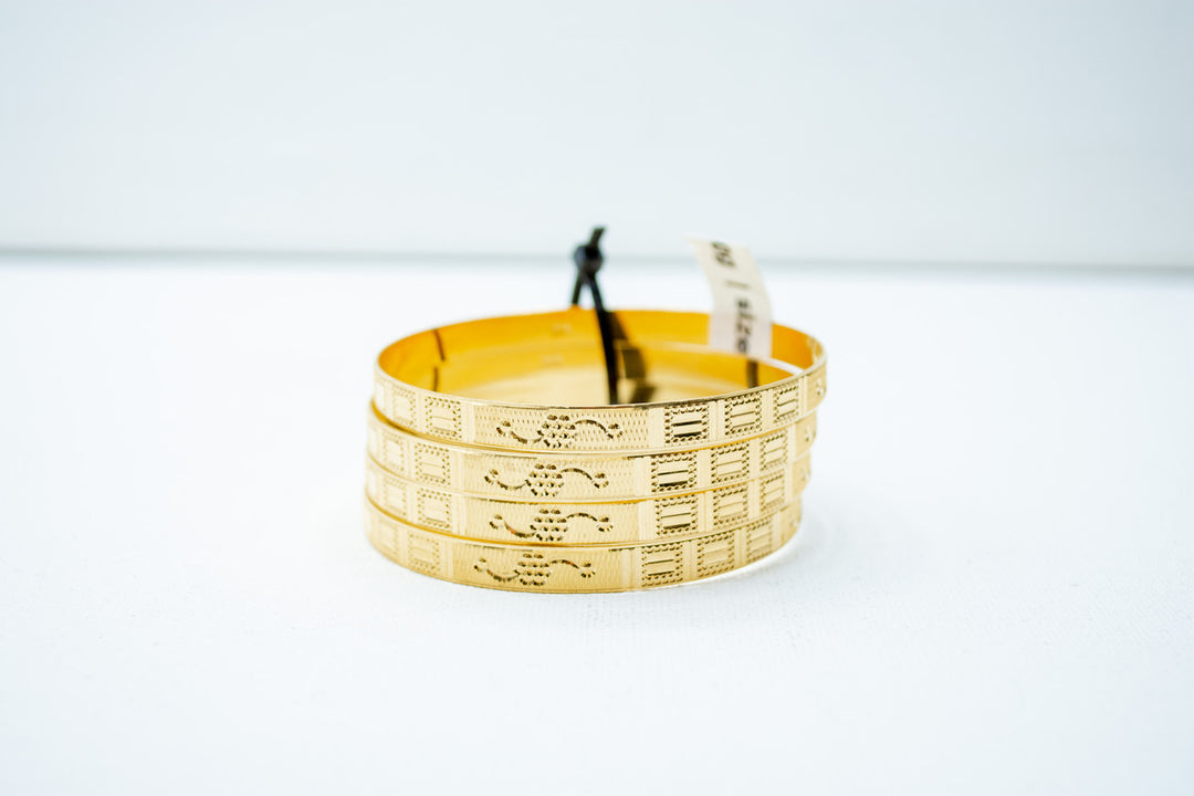 Sleek pale gold ethnic bangles set