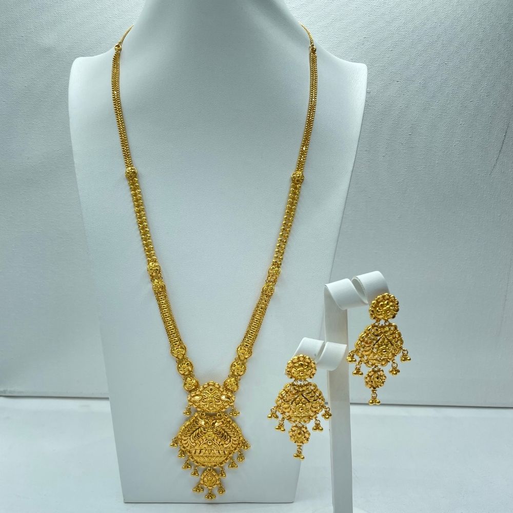 Long gold embellished designer Ranihaar jewelry set
