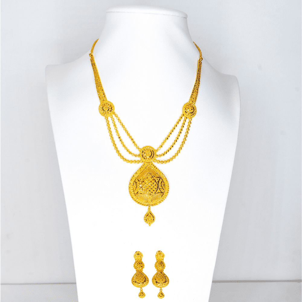 Long traditional gold necklace and earrings
