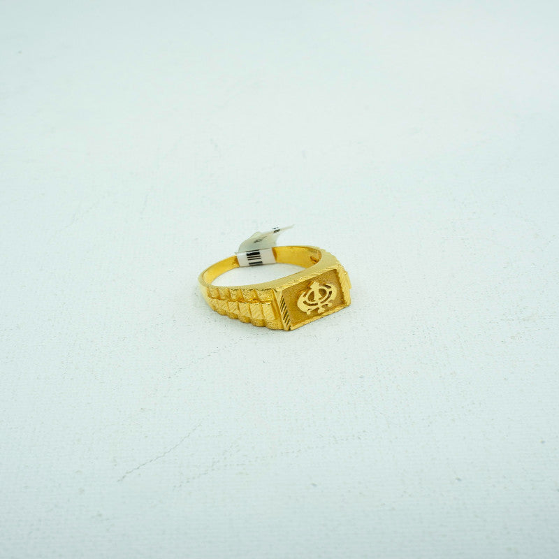 Bright yellow-gold ring with Roman-inspired insignia engraving