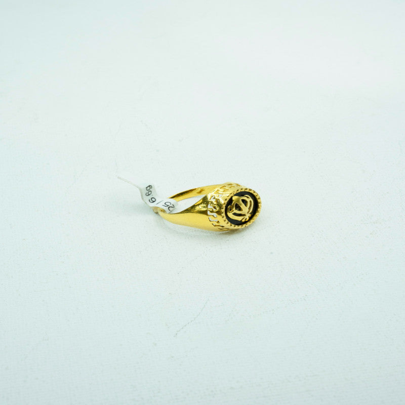 Bright yellow gold signet ring with black stone
