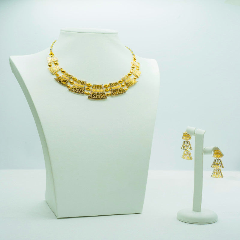 Contemporary designer gold neckpice with intricate work and matching drop earring