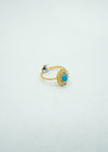 Dainty diamond studded flower with a turquoise colour stone center gold ring