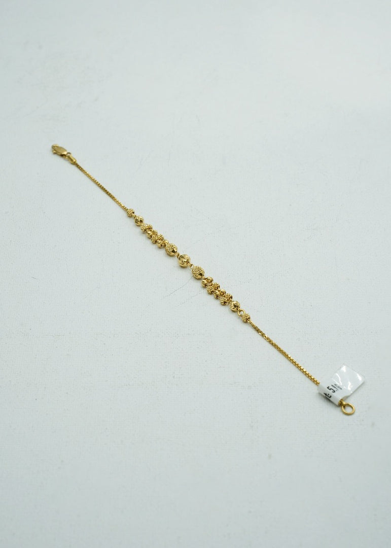 Dainty yellow-gold tiny beaded bracelet