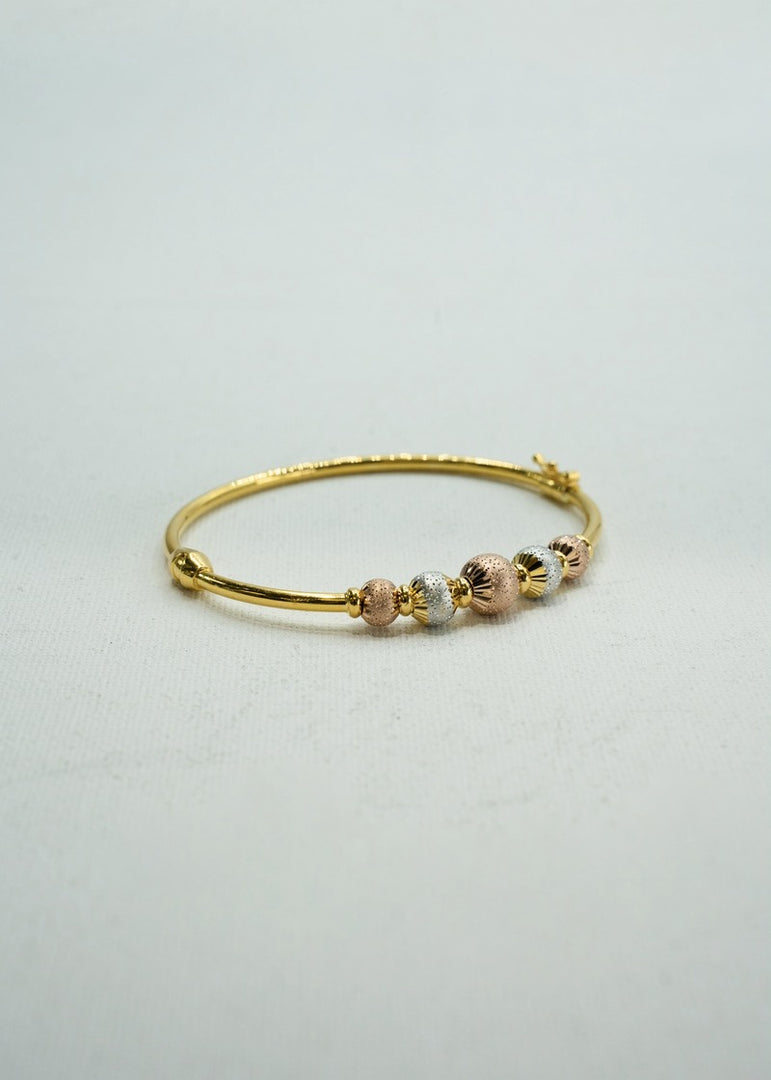 Dainty yellow and rose gold beaded bracelet