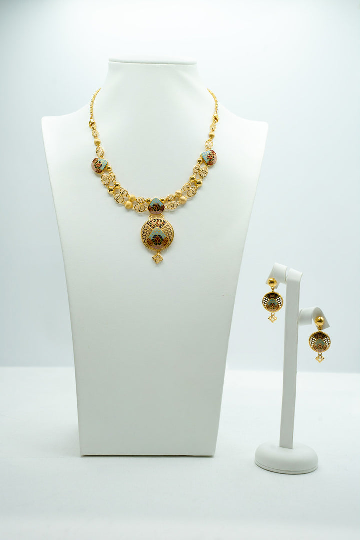 Designer Centrepiece gold necklace with matching drop earrings
