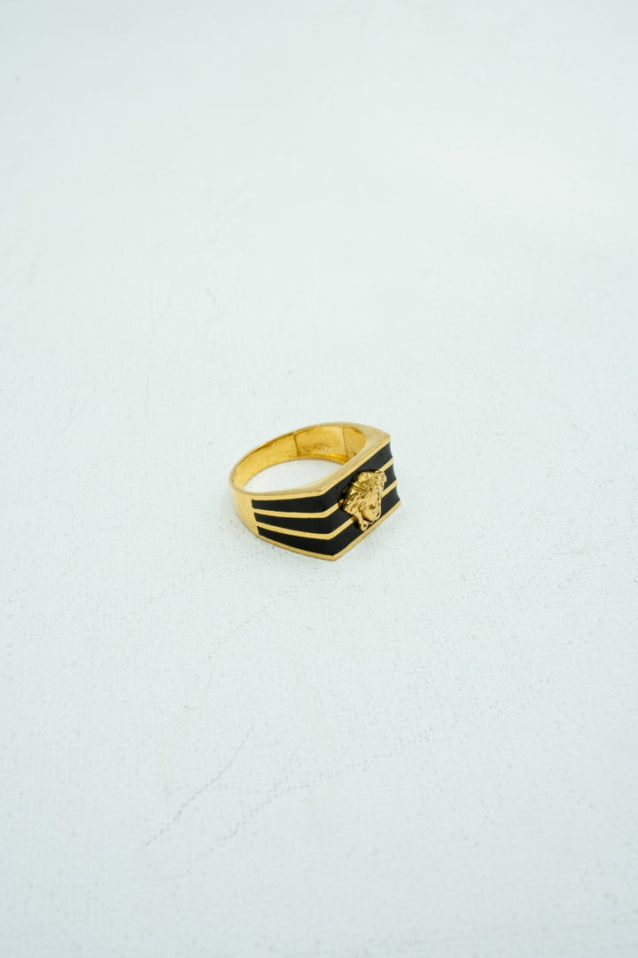 Designer black and gold rectangle signet ring with embossed center