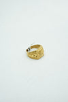 Designer gold ring with intricate carvings