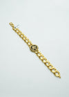 Designer yellow gold Curb & Cuban bracelet with black insignia at the center