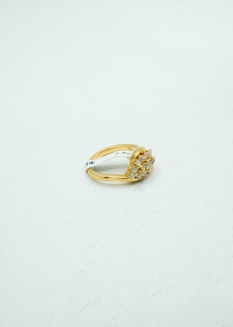 Diamond-crusted designer gold ring