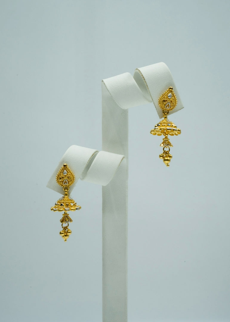 Ethnic yellow gold floral designed drop earrings with stone studs