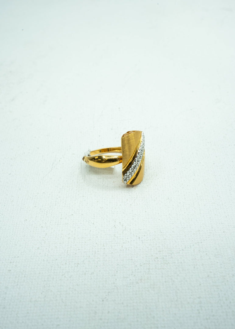 Gold Ring with diamond diagonally encrusted on it