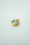 Gold clawed diamond encrusted concentric ring