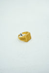 Gold ring with intricate engravings