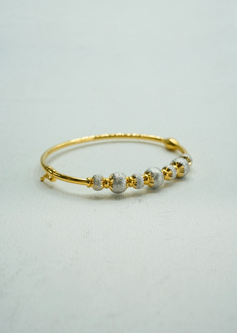 Gorgeous gold and diamond floral bangle bracelet