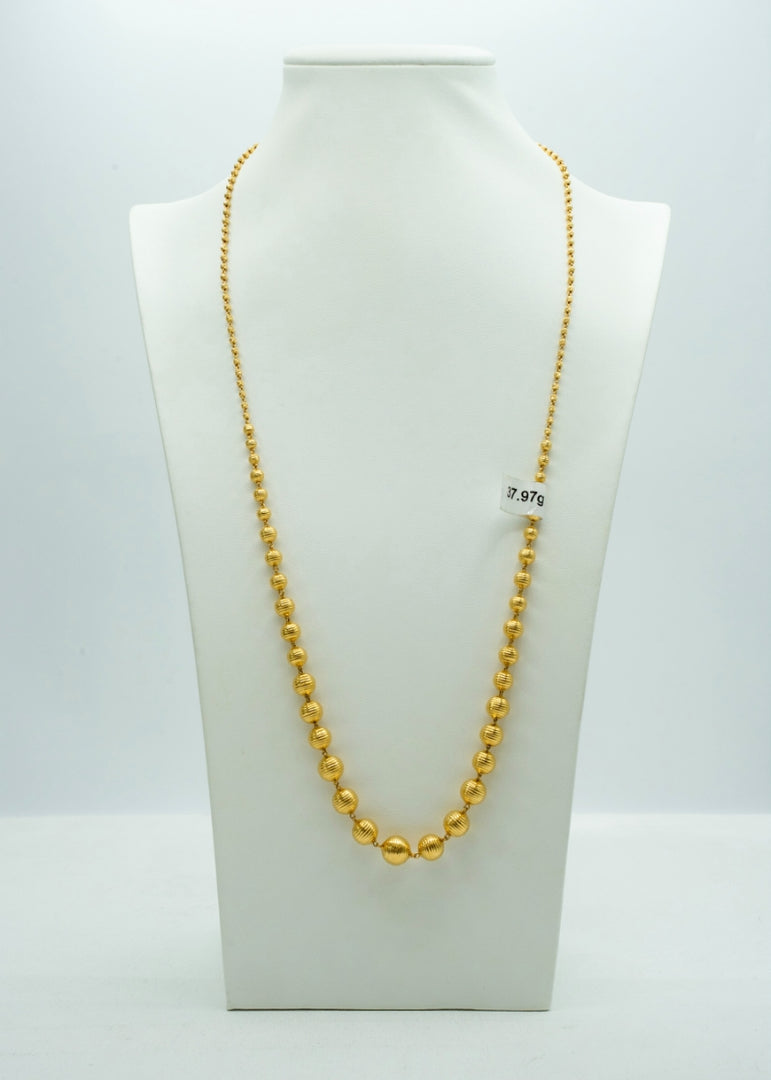 Grand looking long yellow gold beaded chain