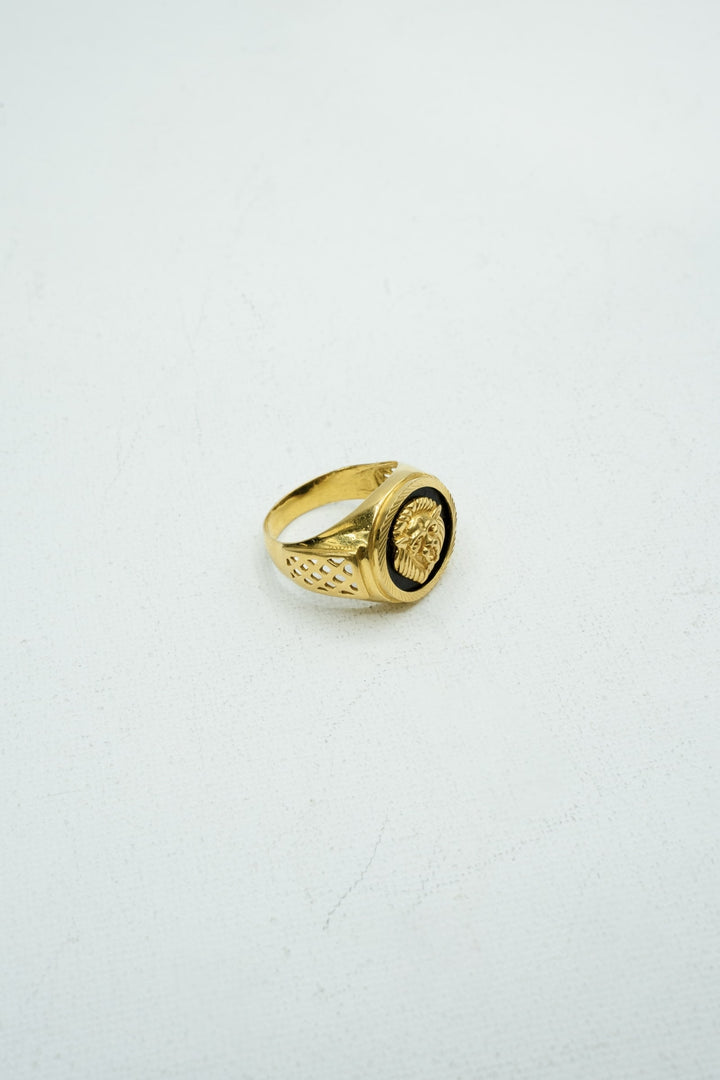 Greek-styled gold and black signet ring with Venus embossing