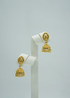 Intricately designed small gold jhumki earrings