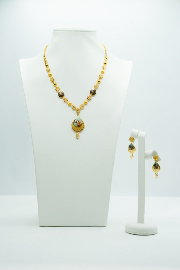Modern yellow gold with colourful intricate design necklace with matching drop earrings