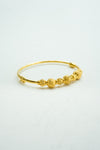 Splendid yellow-gold beaded bangle bracelet