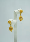 Sunburst bright yellow gold ethnic jhumka earrings