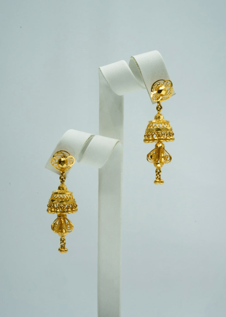 Temple-jewellery inspired gold jhumki earrings with floral design