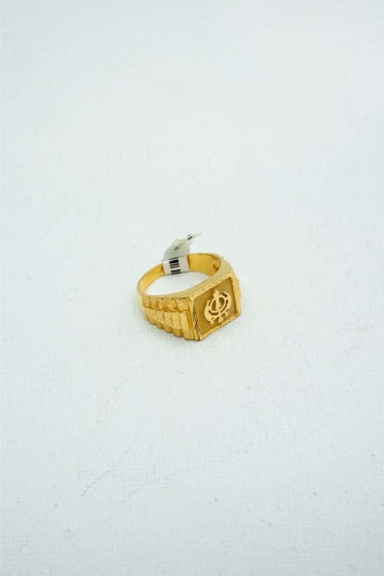 Textured yellow gold square signet ring with carvings