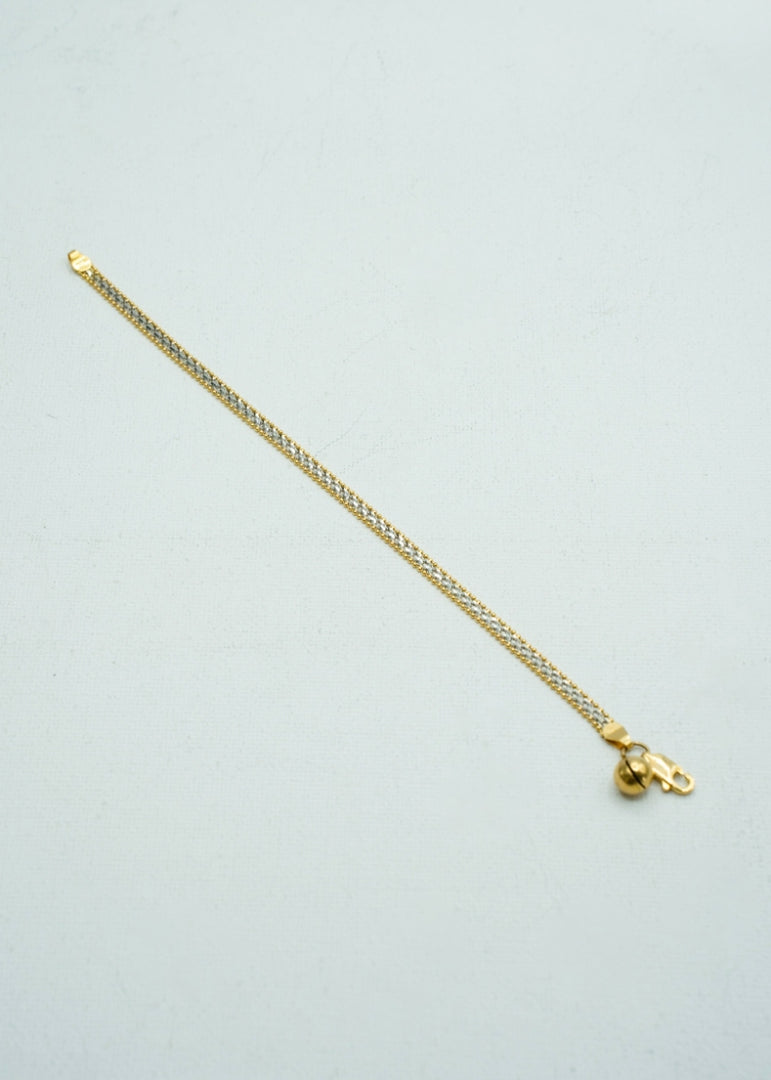 Two-toned cable bracelet in gold
