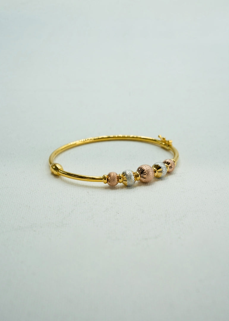 Two-toned yellow and rose gold classy bangle bracelet