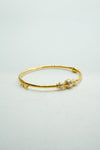 Two-toned yellow and white gold bangle bracelet