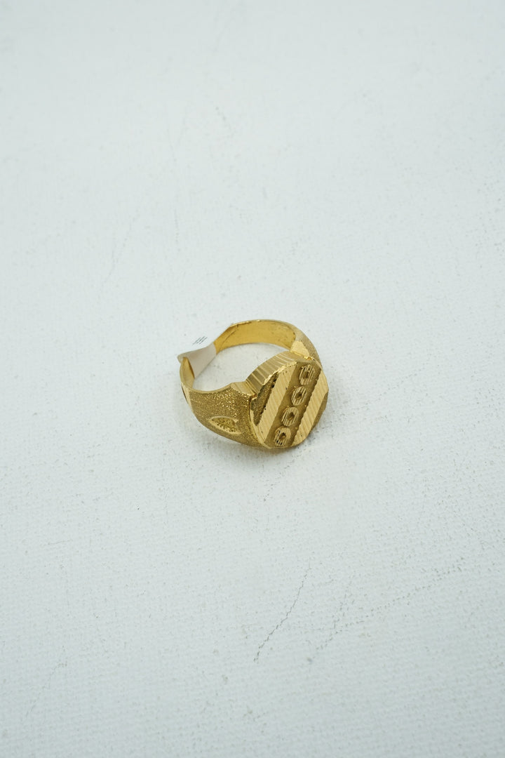 Understated gold signet ring
