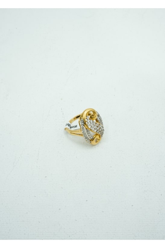yellow gold with a cluster of diamonds in an S shape insignia ring