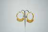 Elegant golden hoop jhumka earrings