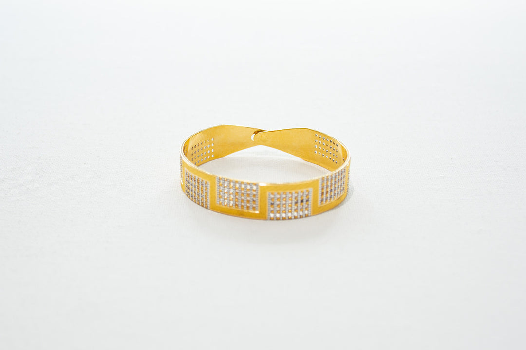 Chunky designer gold bracelet