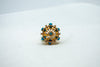 Intricate circular diamond and sapphire designer ring