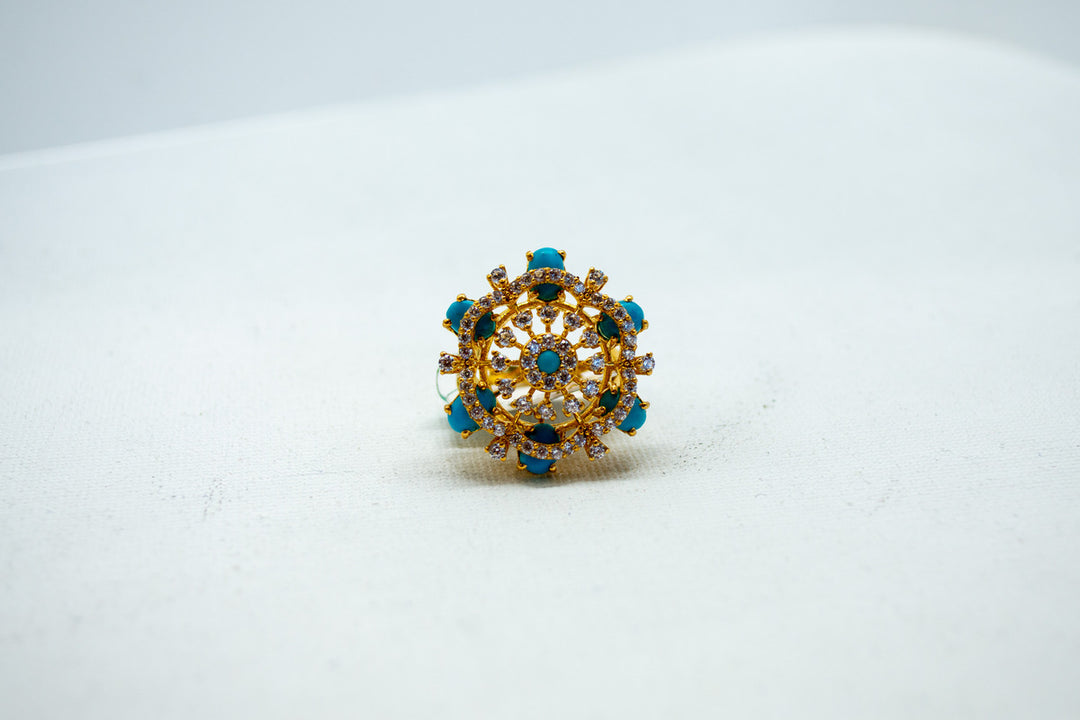 Intricate circular diamond and sapphire designer ring