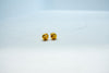 Delicate cut gold stud earrings