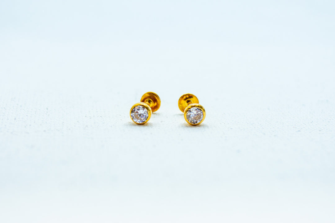 Gold embellished stud earrings