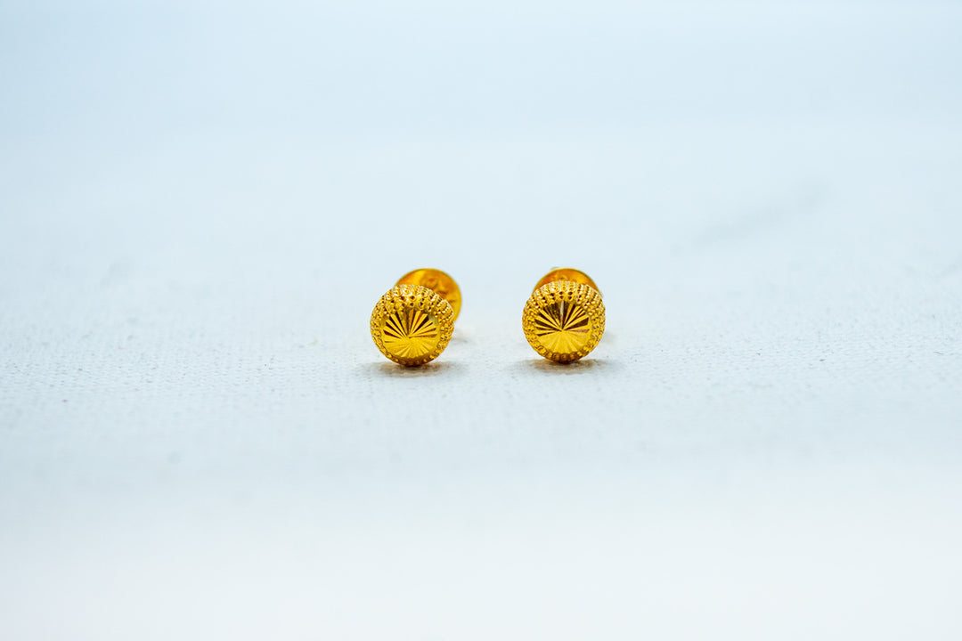 Ornate yellow gold studs earrings